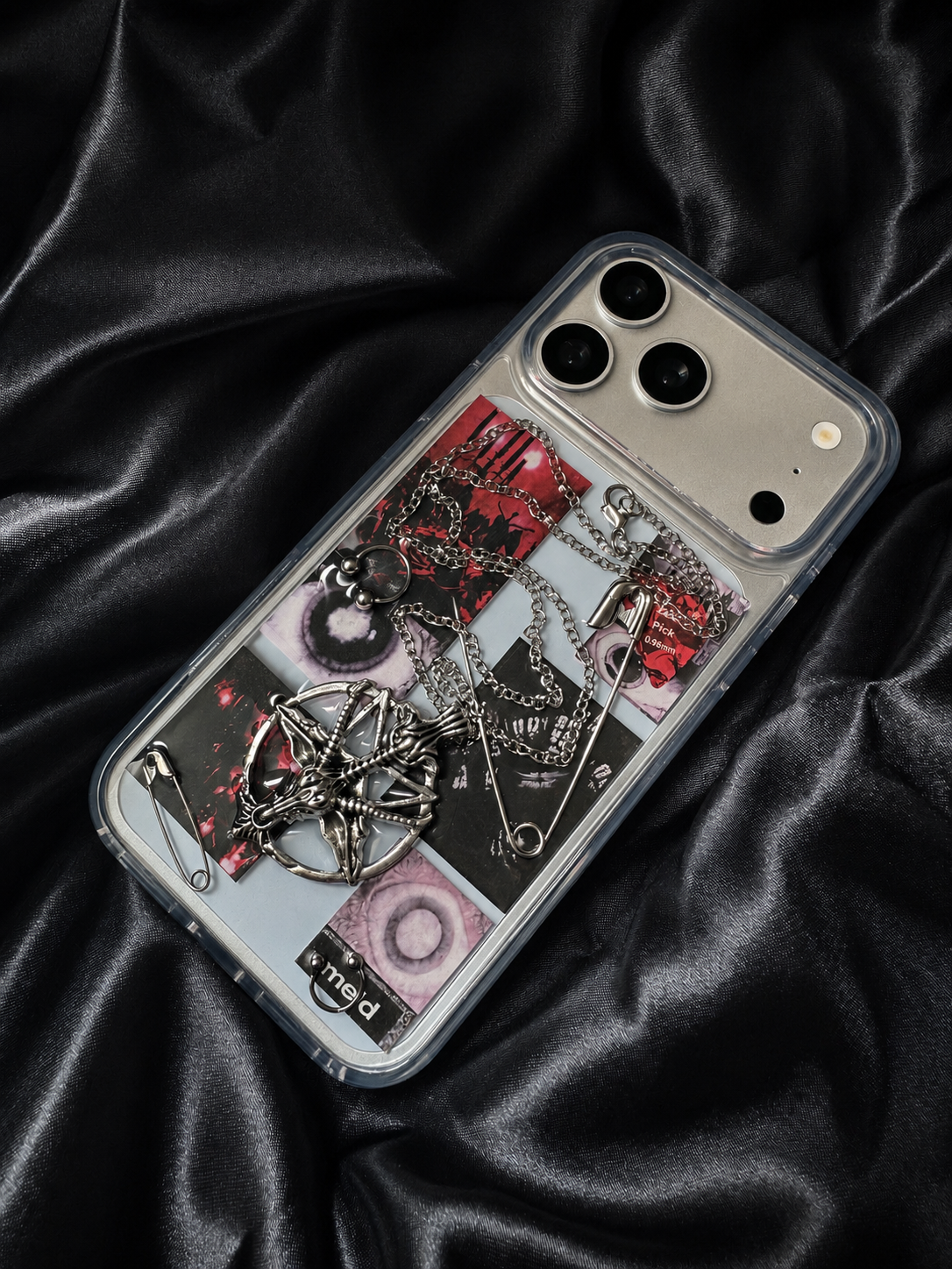 Midnight Relic black and red 3D case shown on a silver iPhone